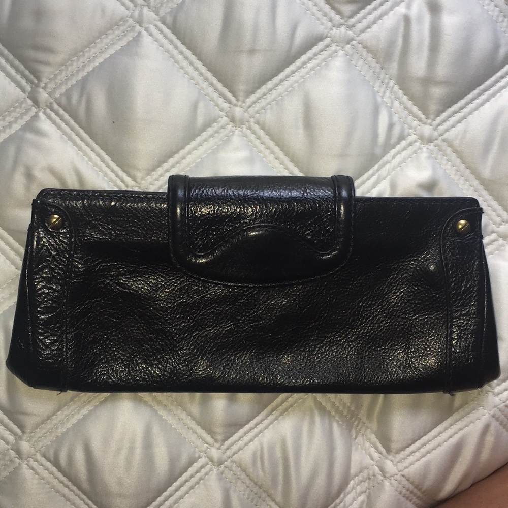 Cole Haan black with bronze hardware clutch purse.